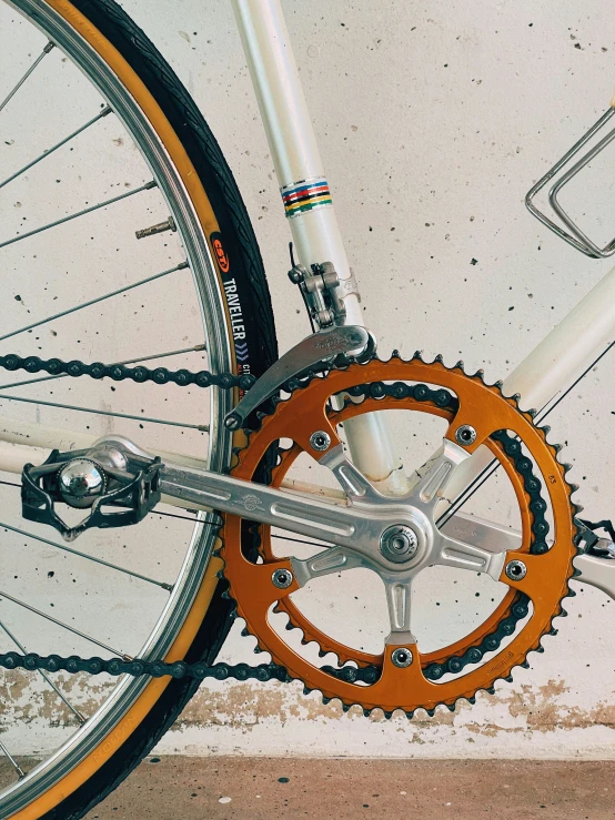 a close up of a bicycle with chains attached to the chain