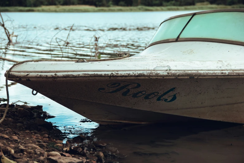 a boat on the shore with no people or vehicles