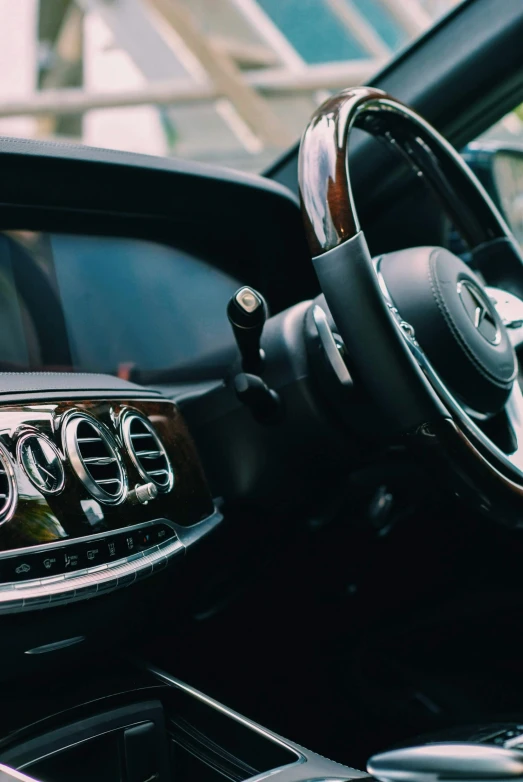 a po taken inside a mercedes with the steering wheel visible