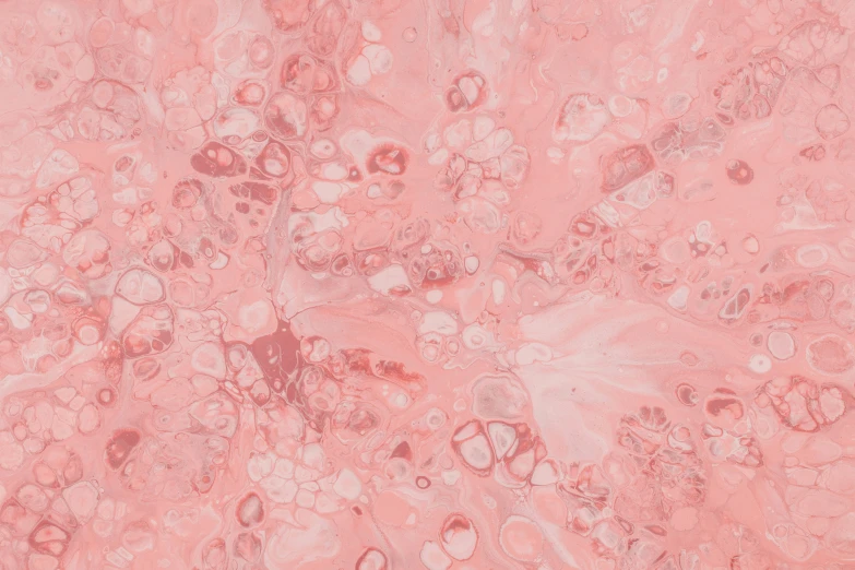 a red marble wall has many bubbles and flowers on it