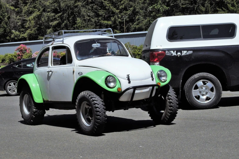 an image of a buggy on display in a parking lot