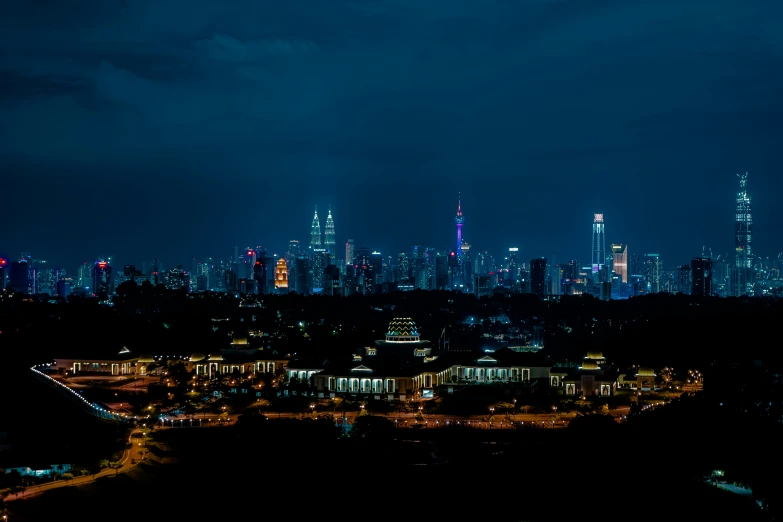 the city skyline at night has very bright lights