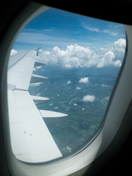 view from the window of an airplane flying above