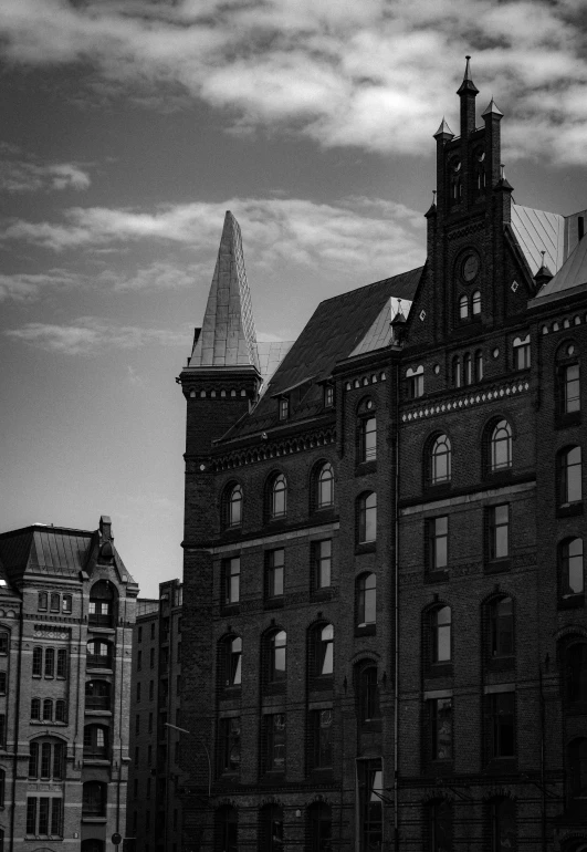 a building with a steeple with windows and a clock tower