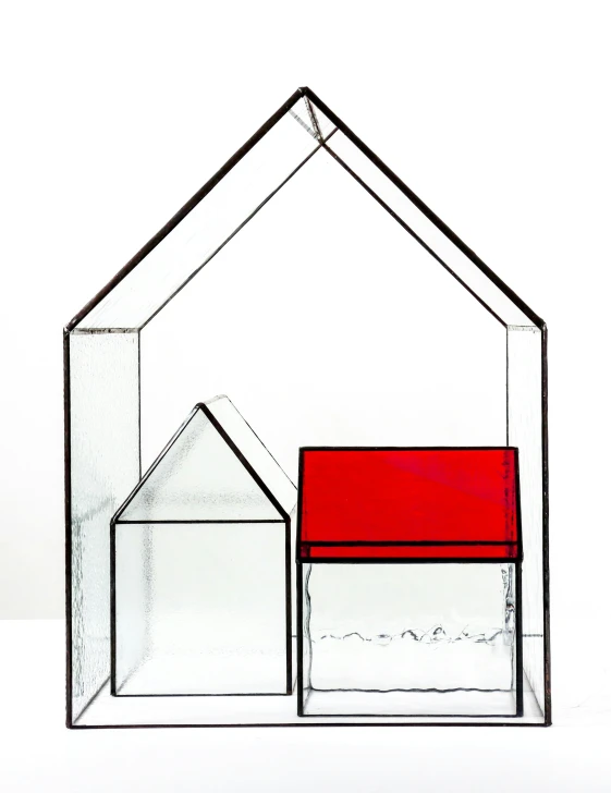 an architectural drawing of a house and a red chair