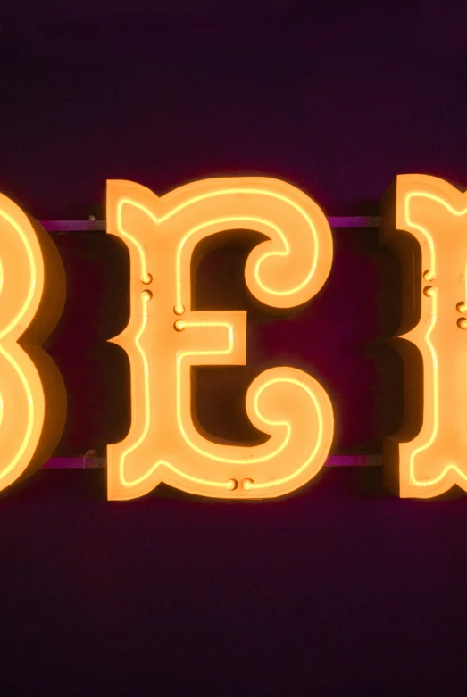 neon sign advertising a bar with the word beer