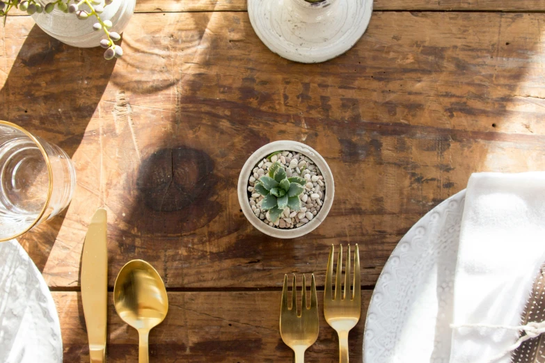 a table with utensils and other items laid out