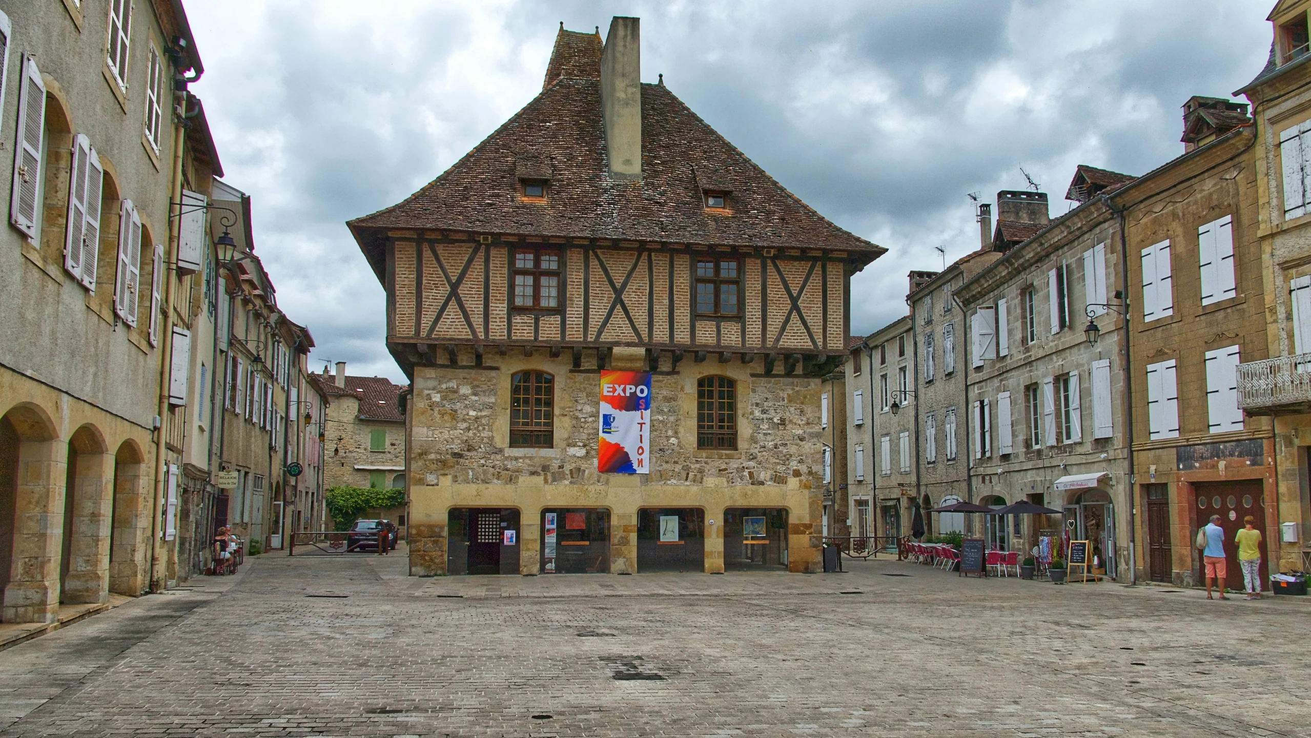 an old building with a flag on the front