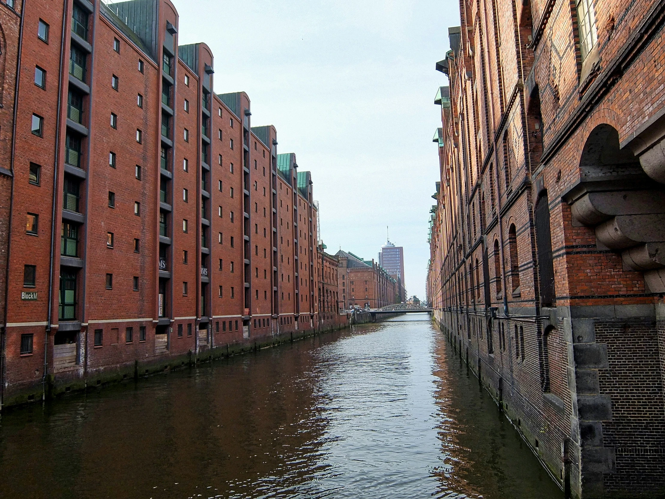 an image of a canal and buildings in a city