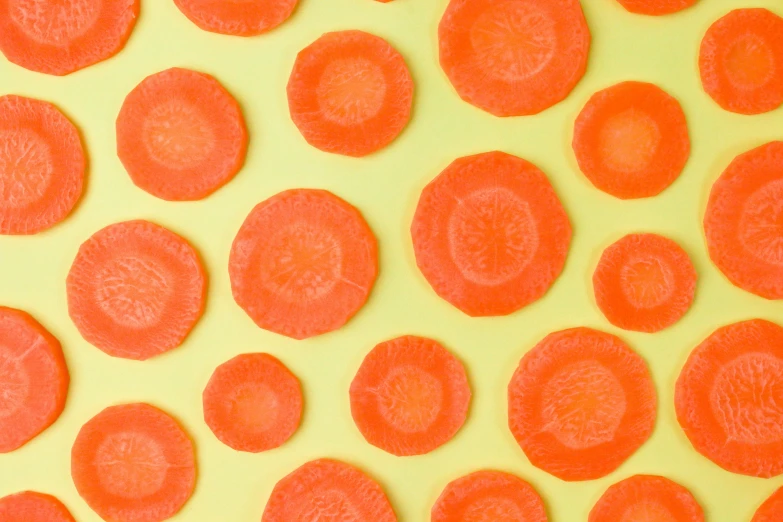 several carrot circles laid out on a table