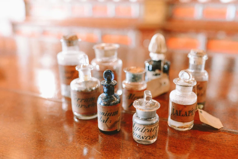 the contents of miniature bottles sit on a table