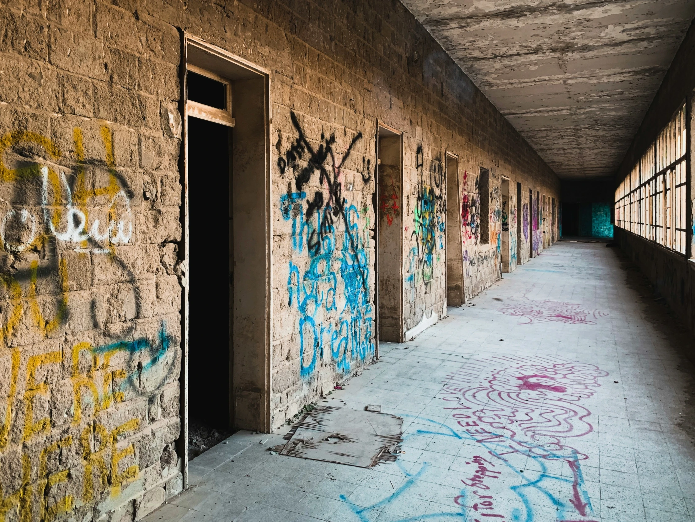 an alley leading up to the door and window