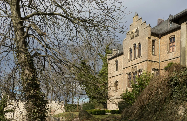 an old building with a clock at the top of it