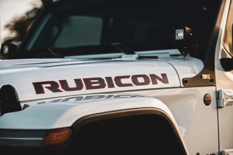 an image of a white truck with rubi on it