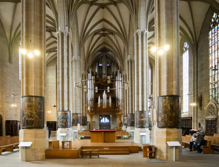 inside a church where people are sitting