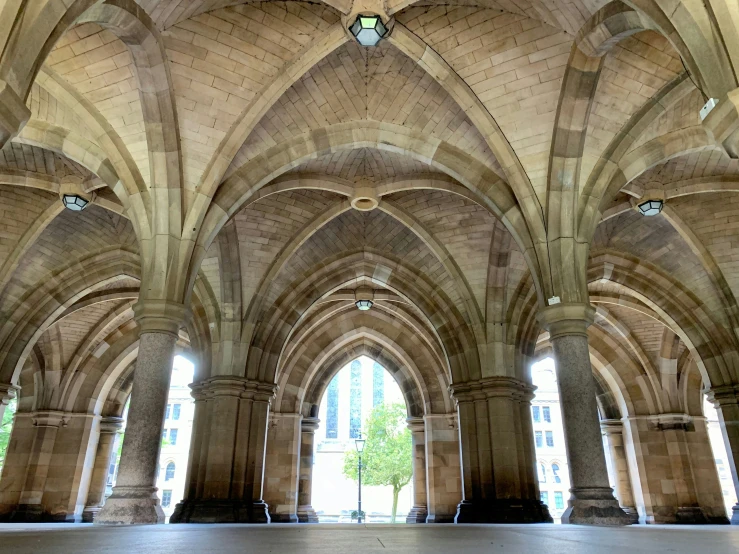 the interior of a building with stone columns