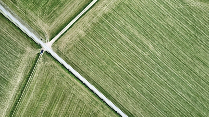 aerial s of roads and grass in a field