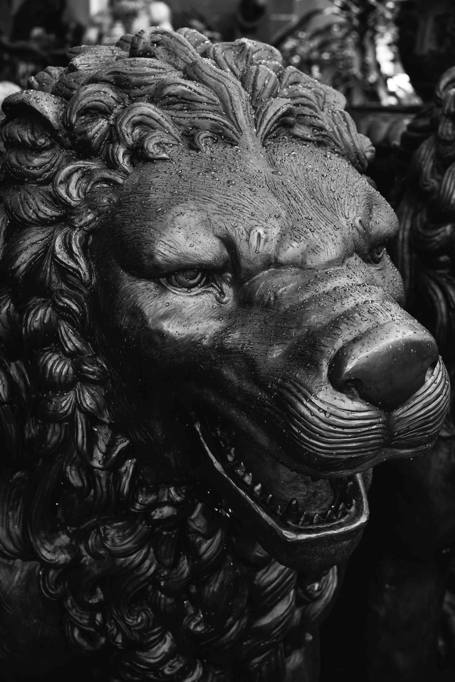 a lion statue on a pedestal inside a building