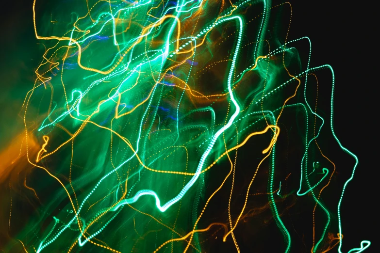 blurry lights in the dark show off streaks of green