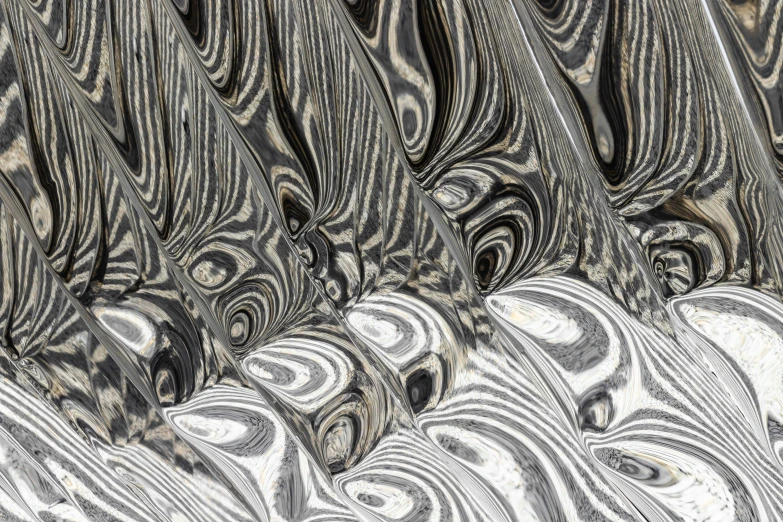 a group of different black and white marble
