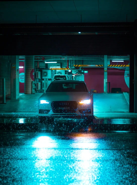 a white truck is parked in a gas station