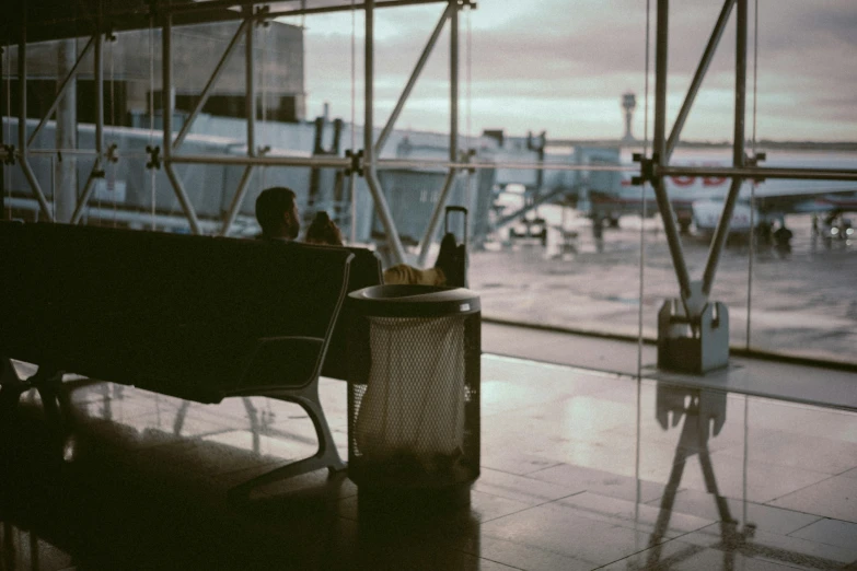 an airport view from the airplane deck with the planes in the distance