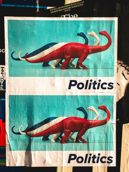 two political ads on a wall with a dinosaur on it