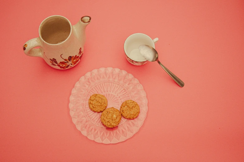 a plate of cookies and a cup of coffee