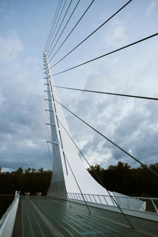 a very tall structure that looks like it is sitting under clouds