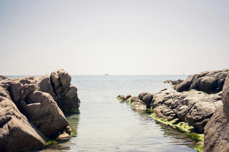 the water near rocks is very clear