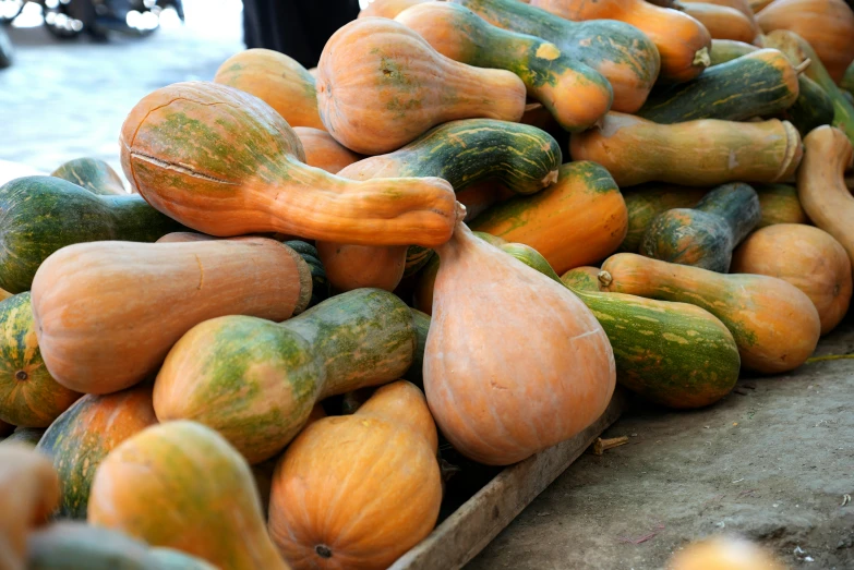 multiple types of vegetables are stacked up together