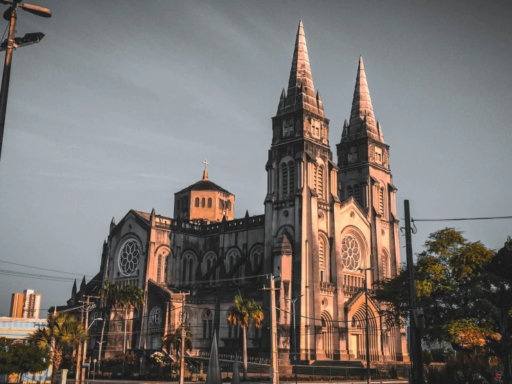 an old cathedral is sitting in the sun