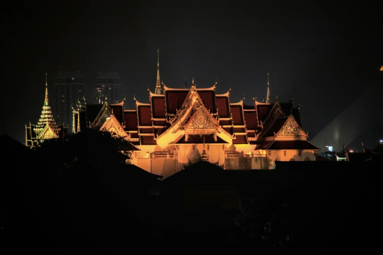 a temple that is lit up in the dark