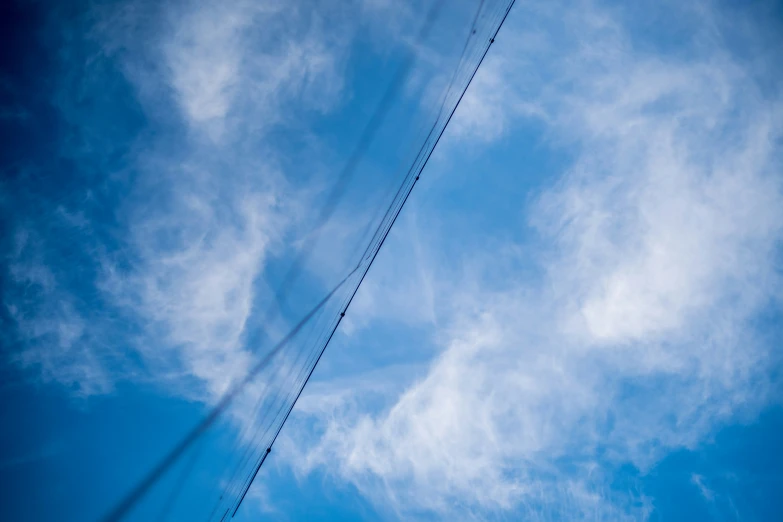 a kite flying high up in the air