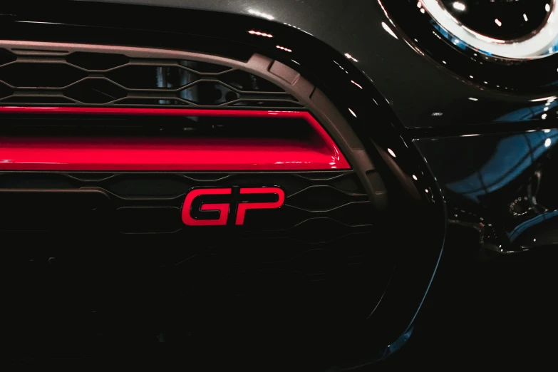 the grill and chrome decoration on a black sports car