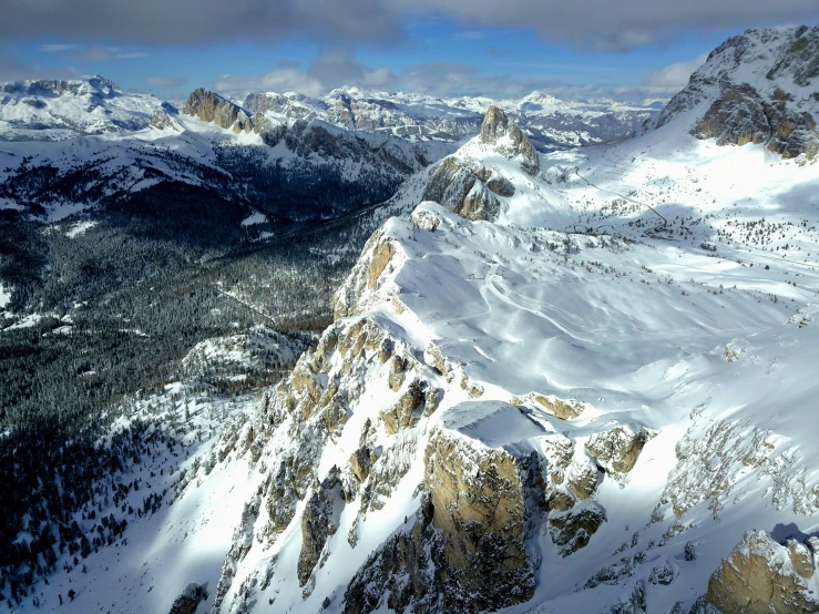 there is a group of mountains that are in the snow