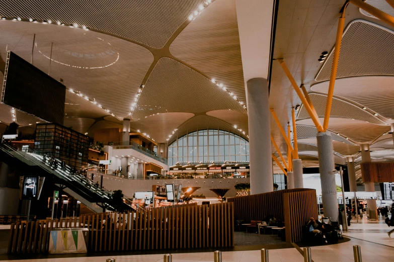 the interior of a large passenger terminal next to stairs