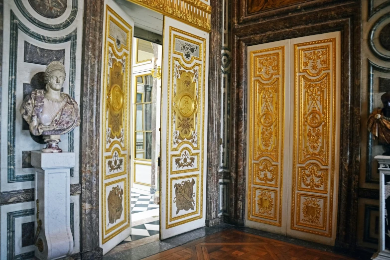 an ornate entrance way is in a building