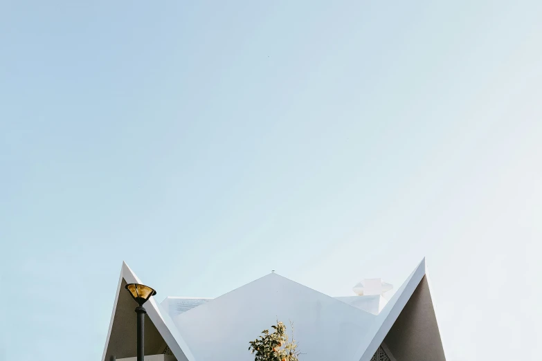 the roof of the building is made of triangular shapes