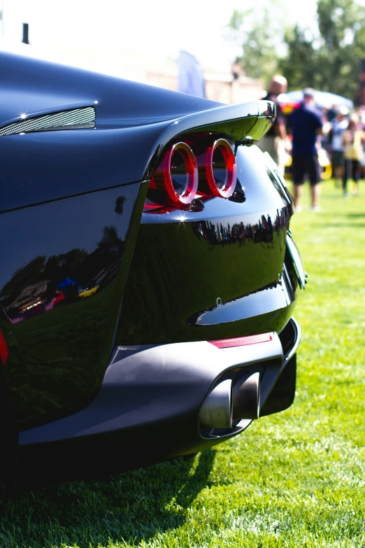 the tail lights on this sports car are pretty bright