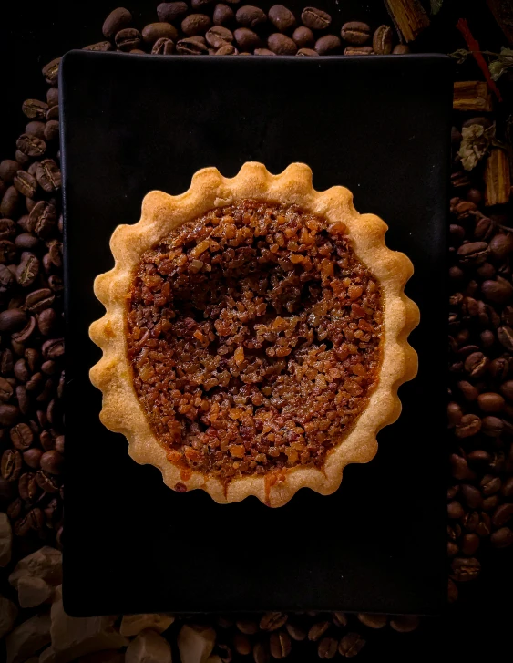 a pecan pie sits on top of a plate