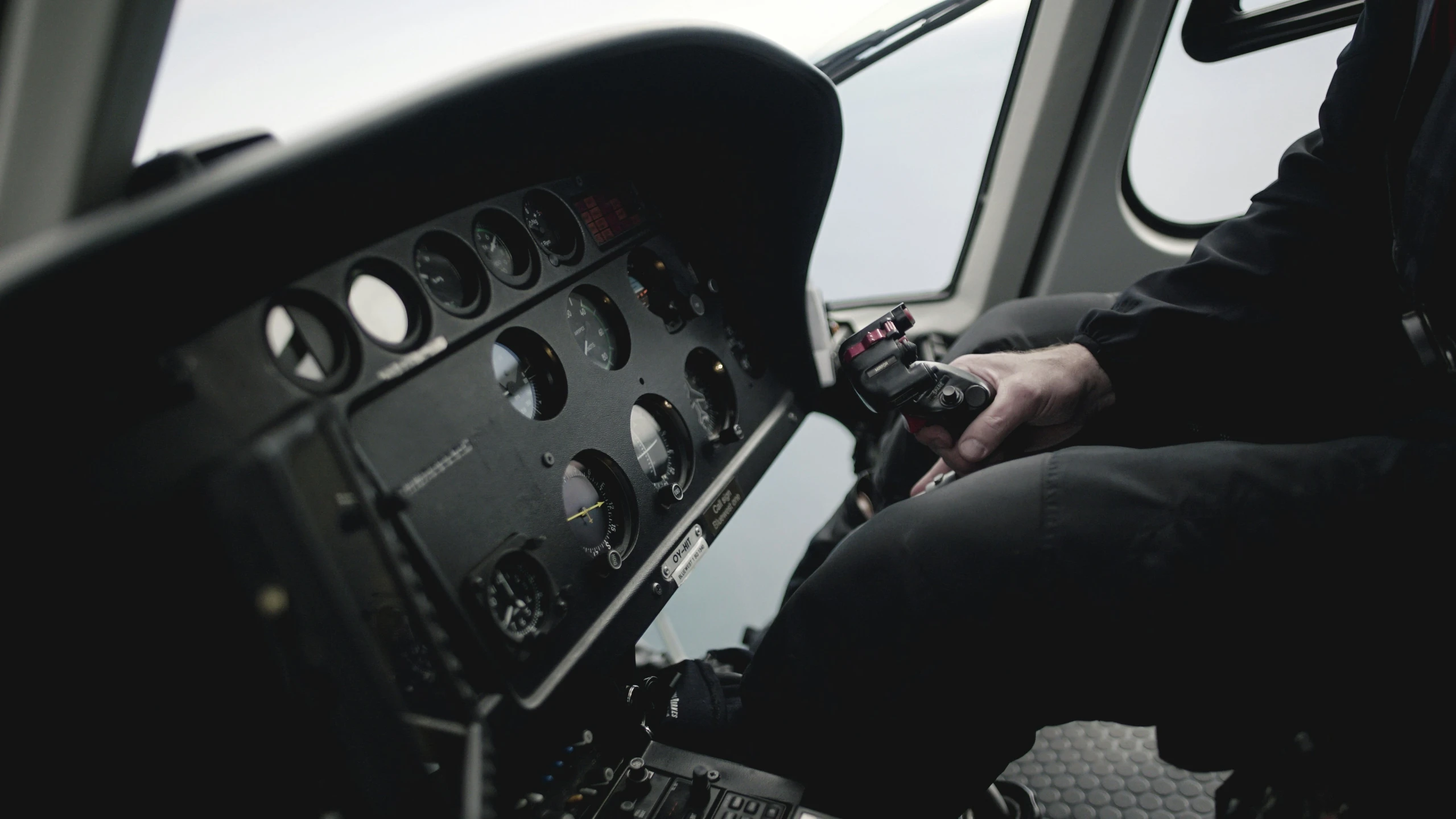 this is a picture of someone sitting in the airplane cockpit