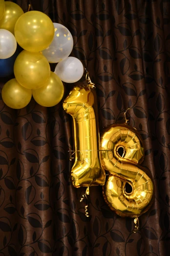 a balloon is next to the number eight