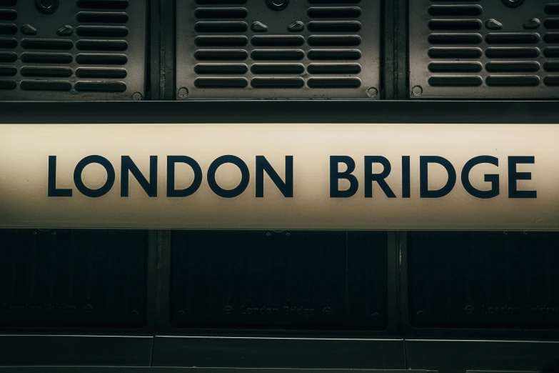 the word london bridge on a wall in a building