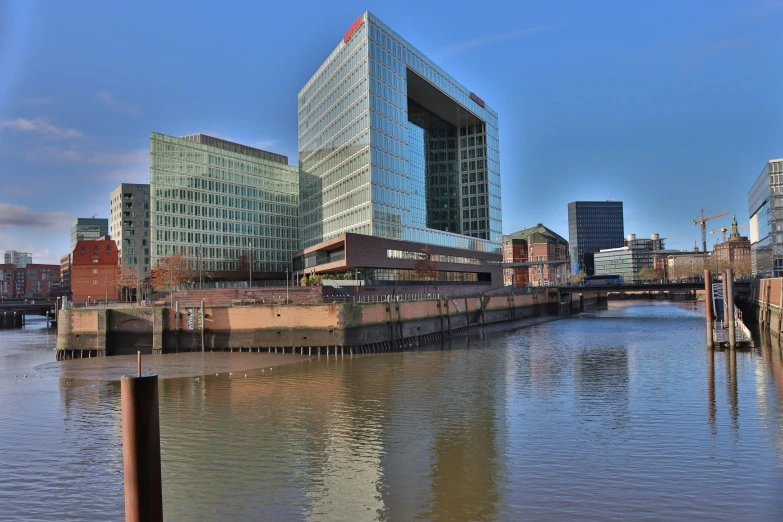 a river is close to tall buildings and bridges