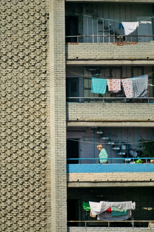 several apartments with clothes drying on a line