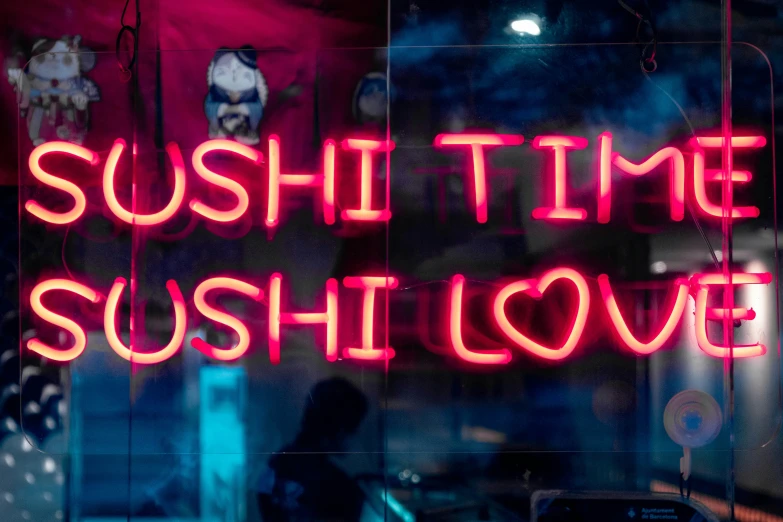 a neon sign that reads sushi time sushi love