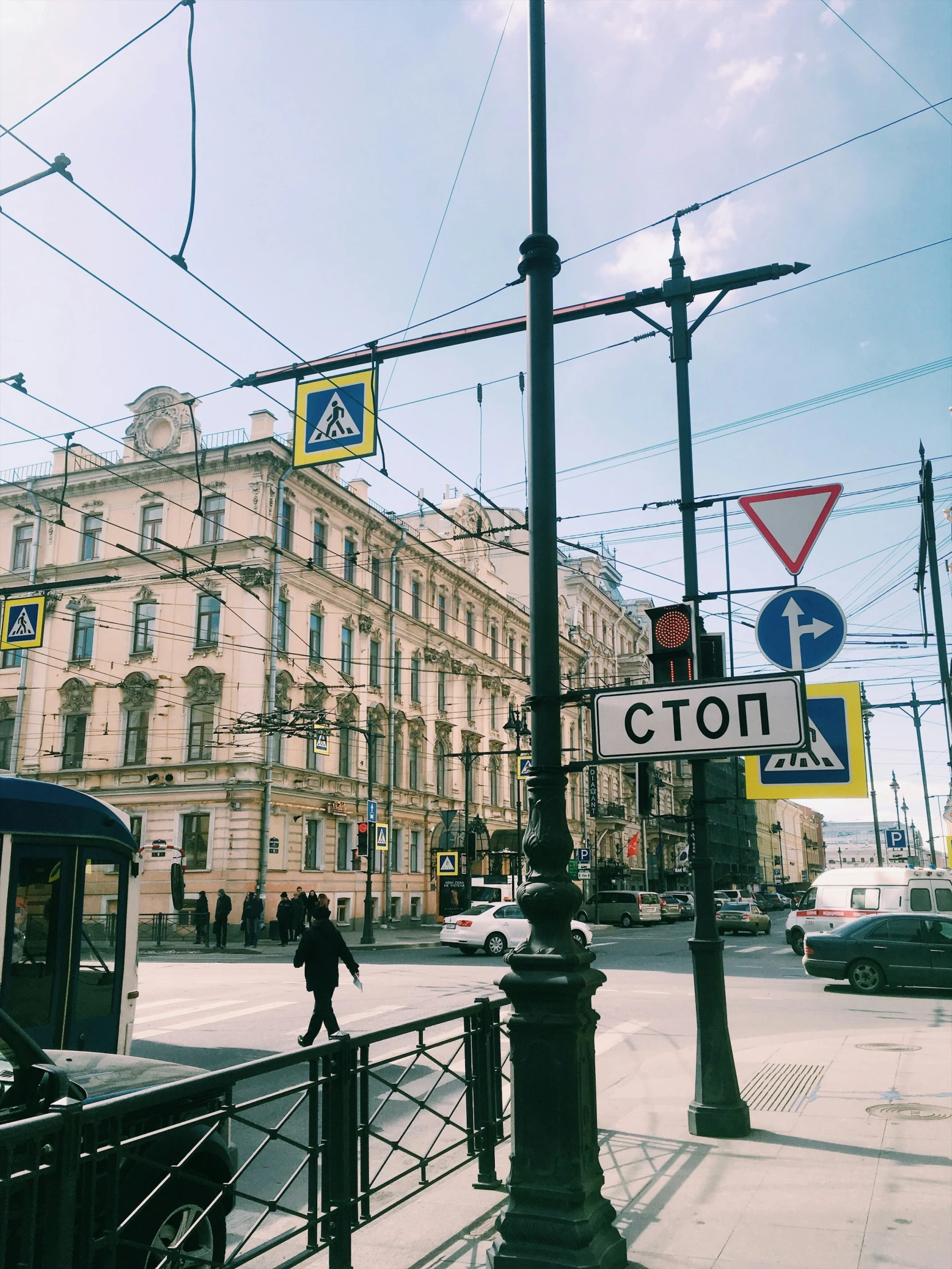 a bus is next to a row of buildings