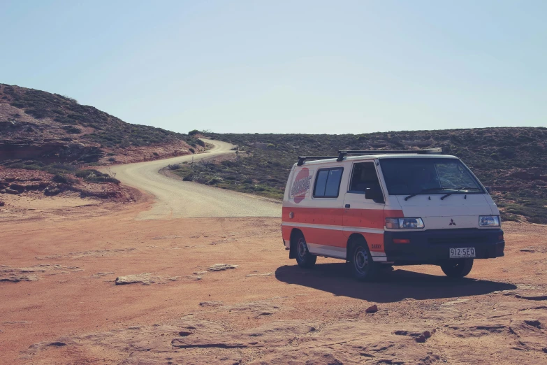 an emergency vehicle parked on dirt trail