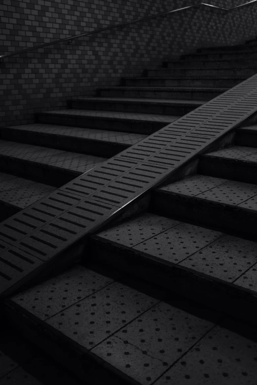 a group of steps on each other in a subway station